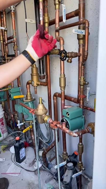 Water heater replacement and mechanical room piping